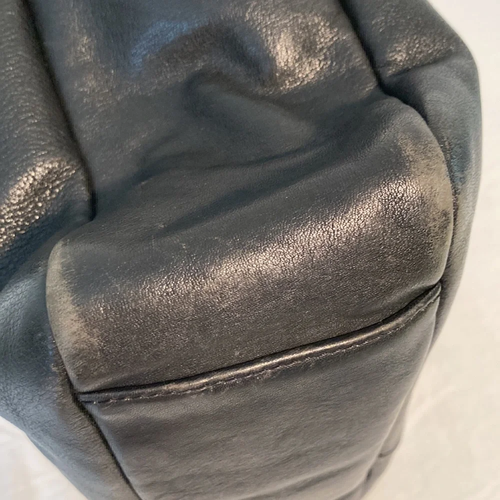 Tumi leather messenger tech lots of pockets